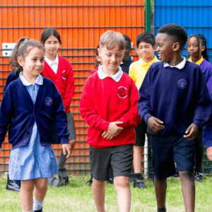 Inclusive Multi Academy Trust Website Post Image - children walking together smiling