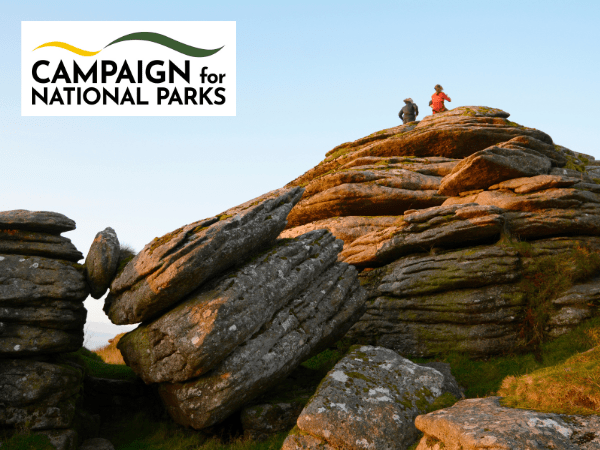 Campaign for National Parks Trustee Case Study Website Post 2 people sitting on top of a large group of rocks