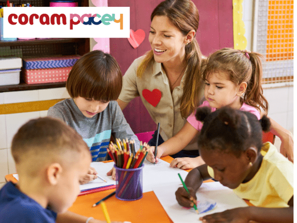 Coram PACEY Transfer case study website 600 x 450 picture of a childminder with 4 young children and with logo