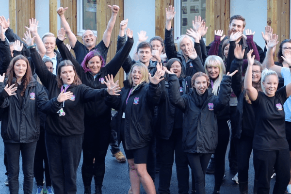 Fair Ways case study people in fair ways tops waving their hands