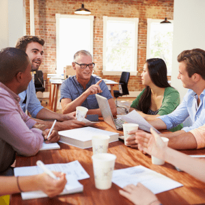 How federated charities can support trustees and boards group of 5 people in a meeting