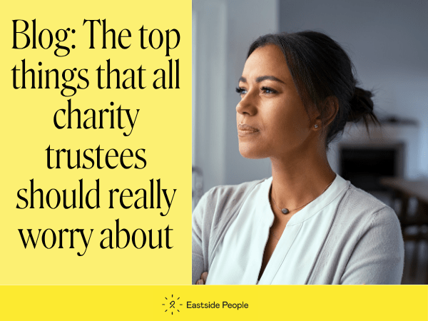 The top things that all charity trustees worry about website blog post plus photo of a woman looking thoughtful